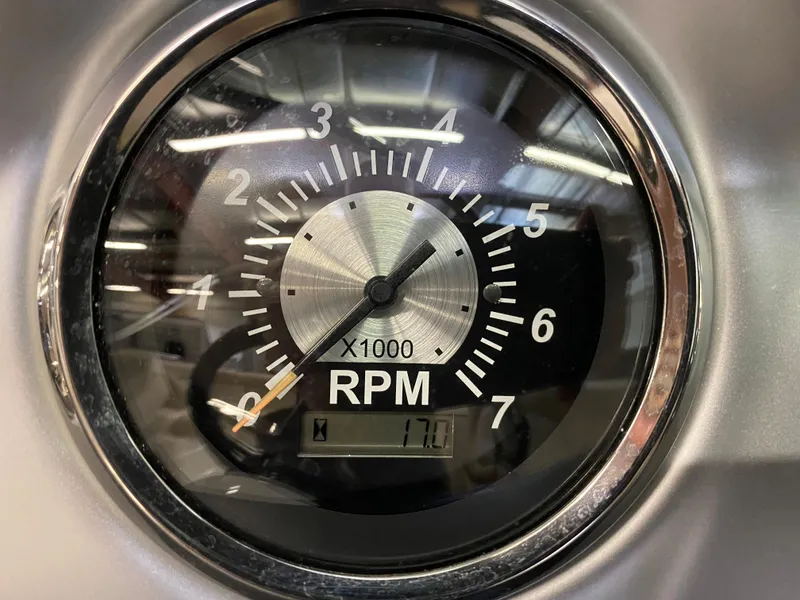 Slide: The Image of Close-up of 2018 NauticStar 243DC Sport Deck RPM gauge. - 10