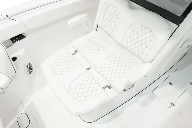 Slide: The Image of 2024 Sportsman 322 OPEN CC boat with white diamond-stitched seating. - 20