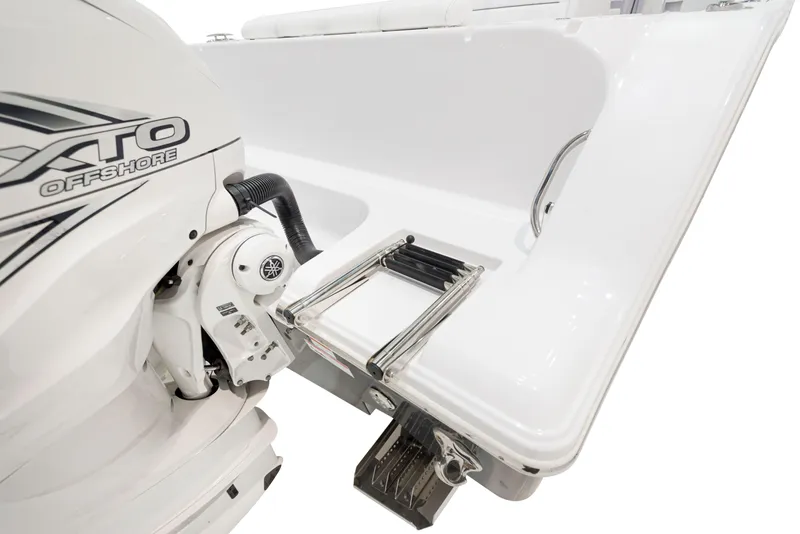 Slide: The Image of 2024 Sportsman 322 OPEN CC boat with XTO Offshore engine and swim ladder. - 31