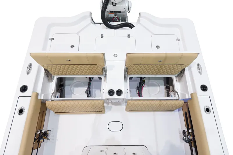 Slide: The Image of 2024 Sportsman Masters 267 Bay Boat with open storage compartments. - 11