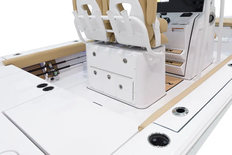 Slide: The Image of 2024 Sportsman Masters 267 Bay Boat interior with seating and storage. - 13