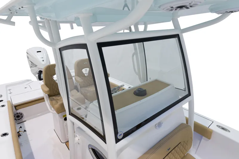 Slide: The Image of 2024 Sportsman Masters 267 Bay Boat cockpit and helm station. - 16