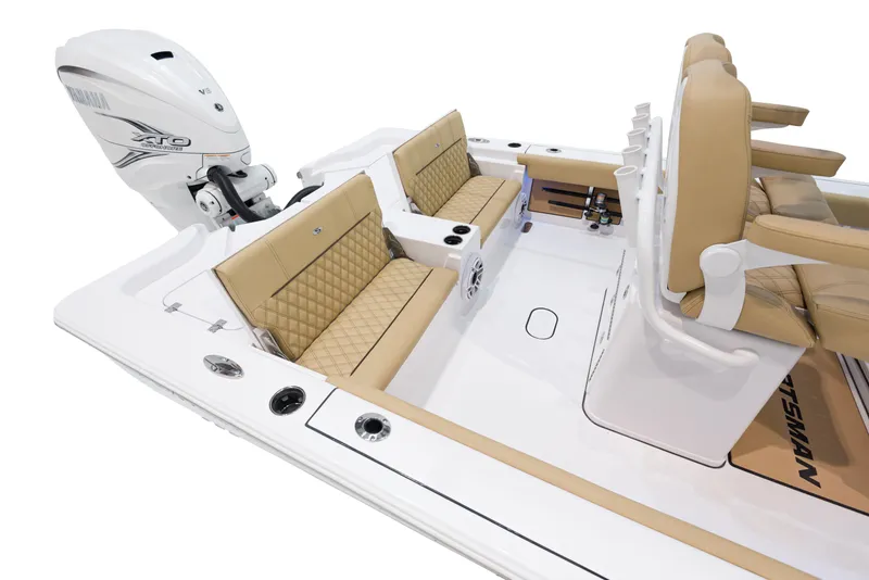 Slide: The Image of 2024 Sportsman Masters 267 Bay Boat with tan seating and white exterior. - 9