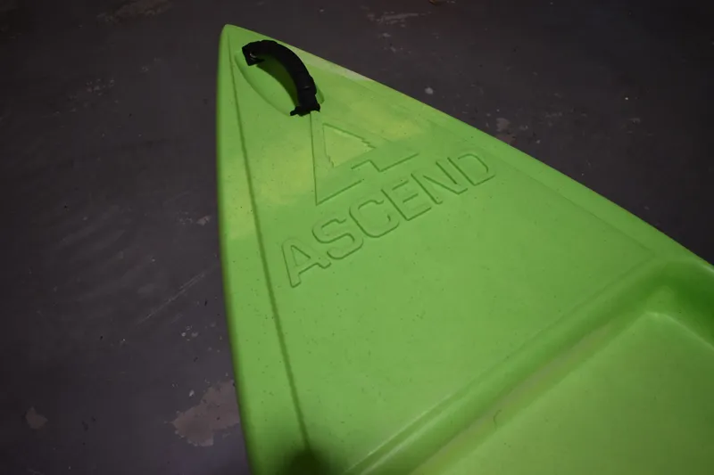 Slide: The Image of Green Ascend 9R Sport Sit-On kayak, 2021 model, with embossed logo and handle. - 8