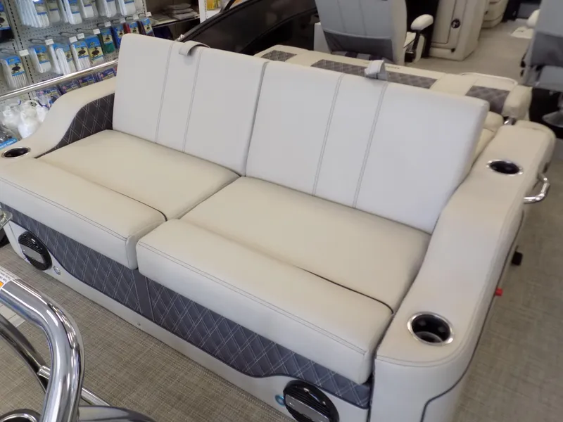 Slide: The Image of 2023 Barletta L23UC boat seating with cup holders and quilted accents. - 16