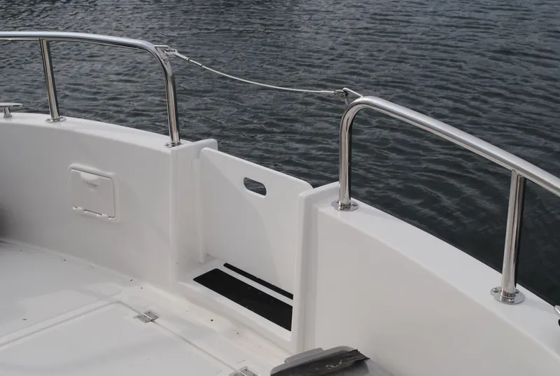 Slide: The Image of 2025 Nordic Tug 34 boat deck with stainless steel railings. - 3