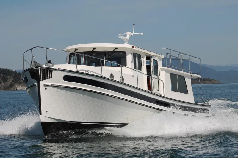 The Image of 2025 Nordic Tug 40 cruising on open water. - 0