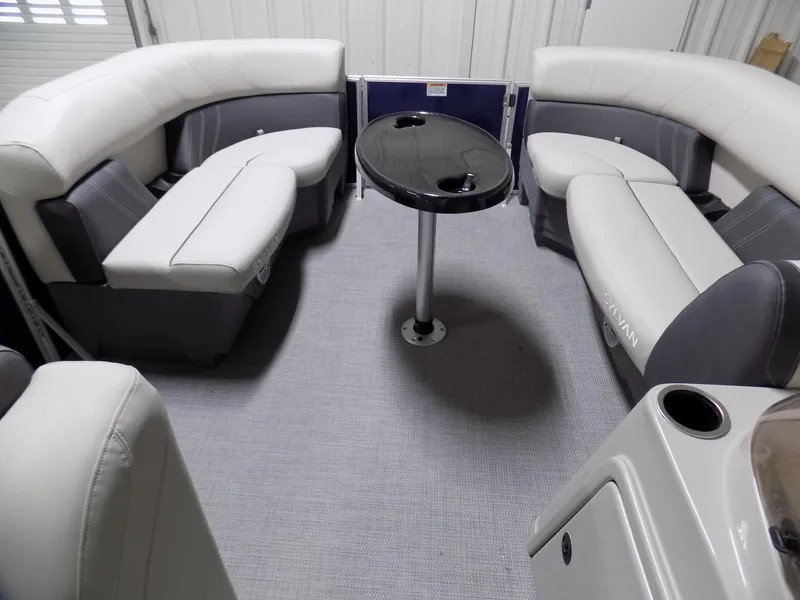 Slide: The Image of 2022 Sylvan Mirage Fish 8522 Party Fish boat interior with seating and table. - 3