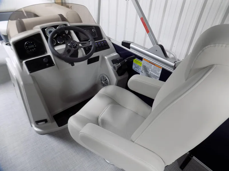 Slide: The Image of Captain's seat and helm of 2022 Sylvan Mirage Fish 8522 Party Fish boat. - 6