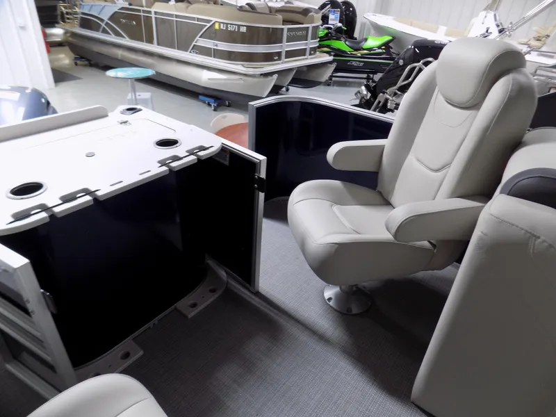 Slide: The Image of 2022 Sylvan Mirage Fish 8522 Party Fish boat interior with seating and table setup. - 9