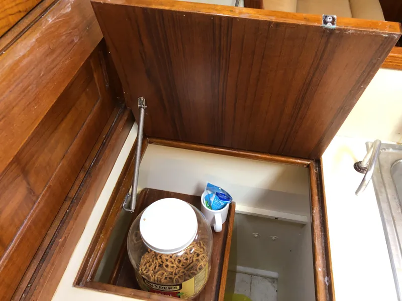 Slide: The Image of Open wooden cabinet with jar and toothpaste, Valiant 50, 1995 model. - 27