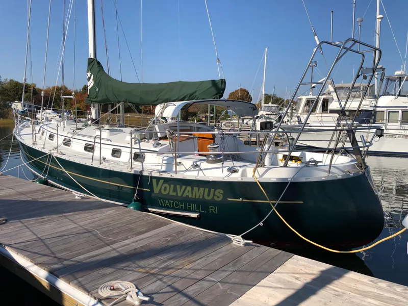 Slide: The Image of Sailboat docked at marina, Valiant 50, 1995 model, named "Volvamus," Watch Hill, RI. - 3