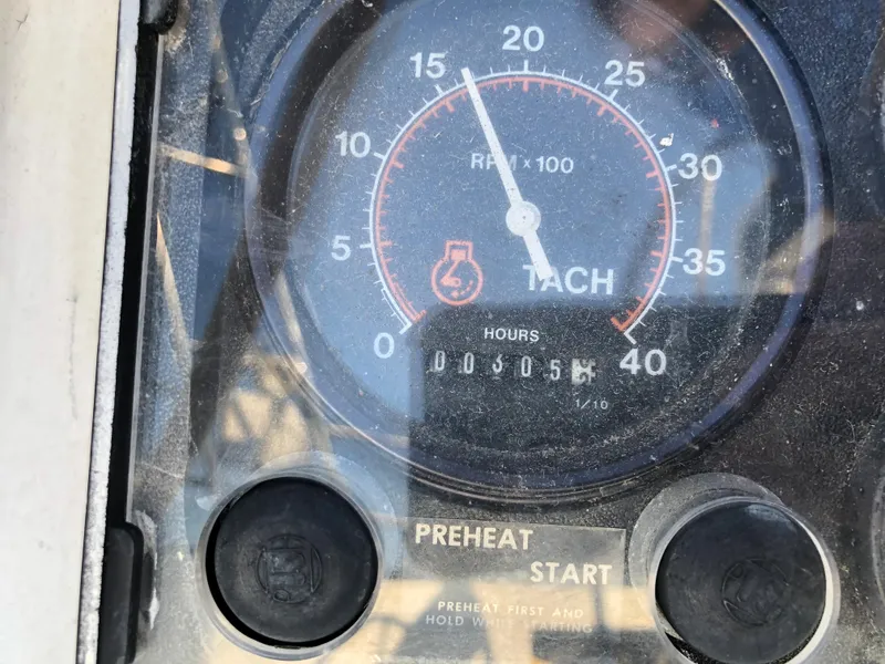 Slide: The Image of Tachometer of 1995 Valiant 50 showing RPM and engine hours. - 41