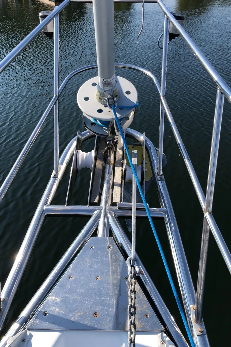 Slide: The Image of Bow of a 1995 Valiant 50 sailboat with anchor and railing. - 9