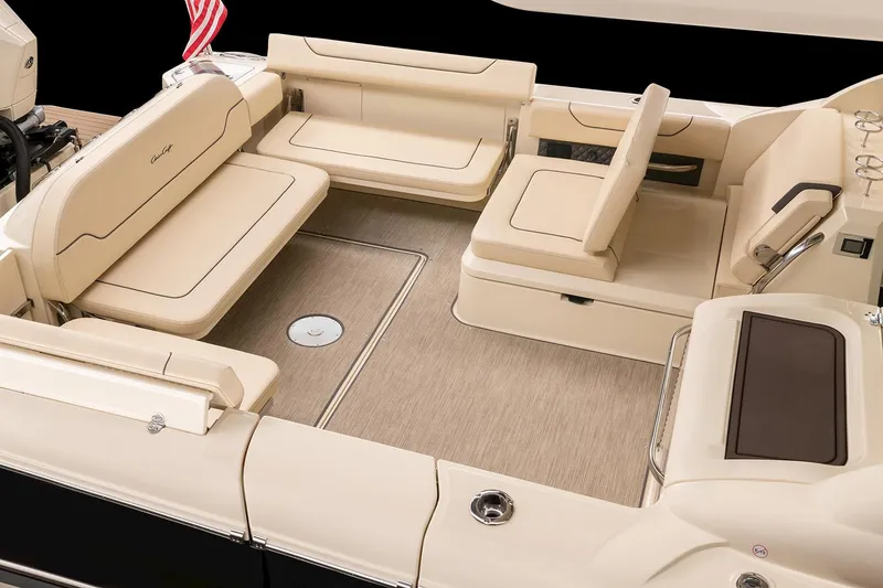 Slide: The Image of 2024 Chris-Craft Calypso 35 boat interior with seating, deck, and sunset view. - 4