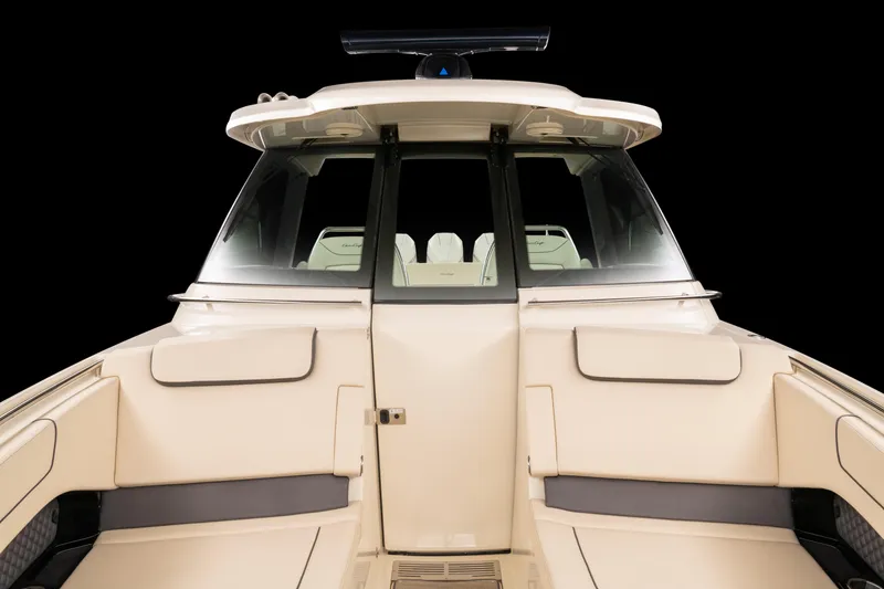 Slide: The Image of 2024 Chris-Craft Calypso 35 interior with elegant seating and sleek dashboard design. - 6