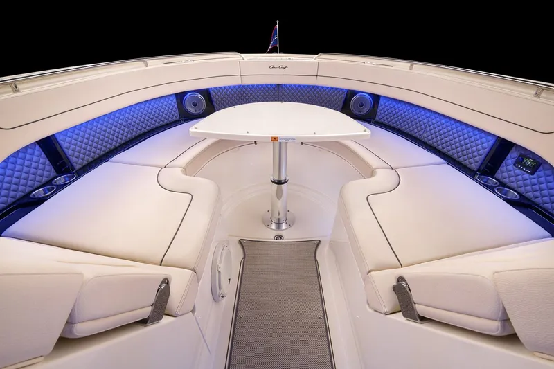 Slide: The Image of 2024 Chris-Craft Calypso 35 helm with wooden steering wheel and modern dashboard. - 7
