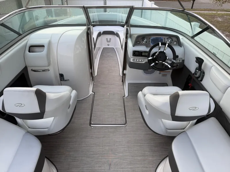 Slide: The Image of 2013 Regal 2500 Bowrider interior with sleek design and modern dashboard. - 28