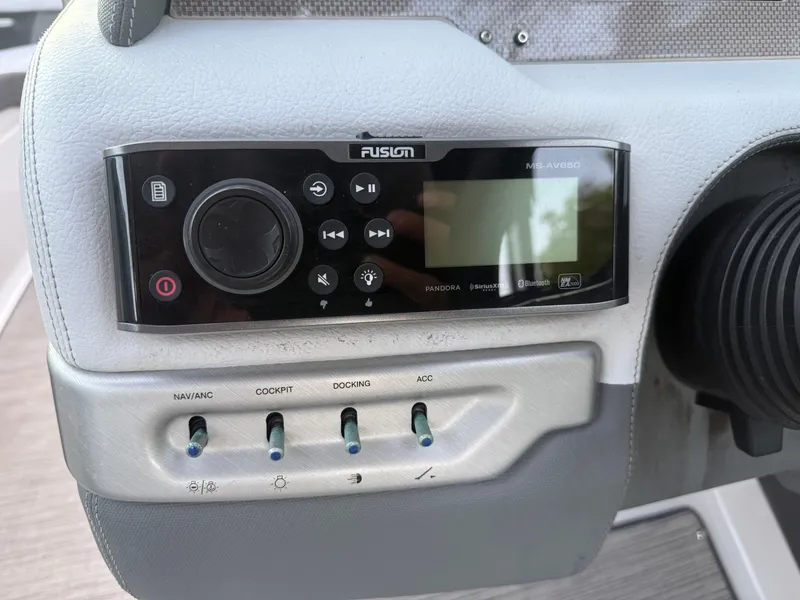Slide: The Image of Control panel of a 2013 Regal 2500 Bowrider with Fusion audio system. - 39