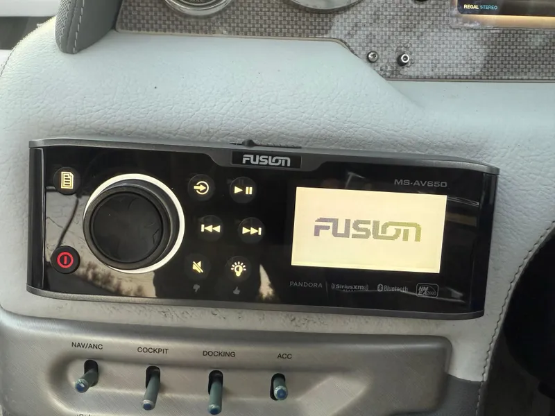 Slide: The Image of Fusion MS-AV650 stereo system on 2013 Regal 2500 Bowrider dashboard. - 40