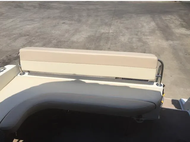 Slide: The Image of 1998 Doral 2500 SC boat seating area with beige and gray upholstery. - 12