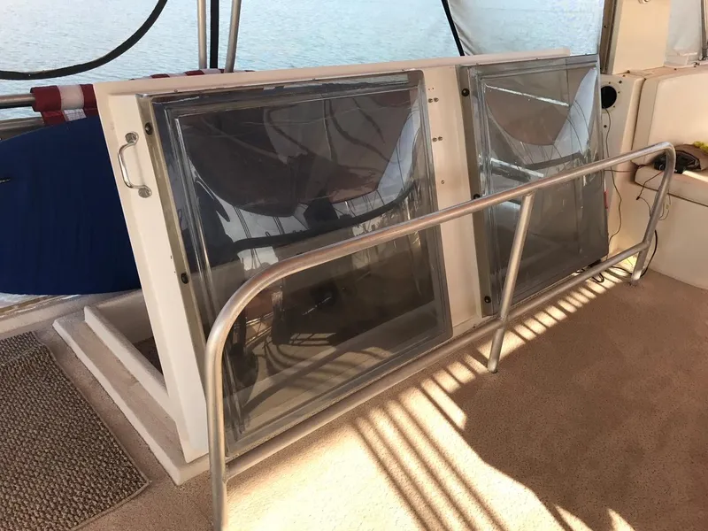 Slide: The Image of 2003 Monticello River Yacht interior with windows and railing. - 34