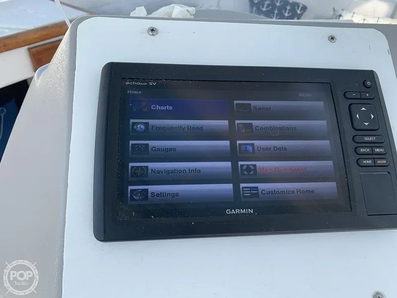 Slide: The Image of Garmin navigation system on a 1994 Cruisers Yachts Express Bridge. - 23