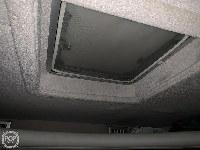 Slide: The Image of 1994 Cruisers Yachts Express Bridge interior ceiling hatch. - 41