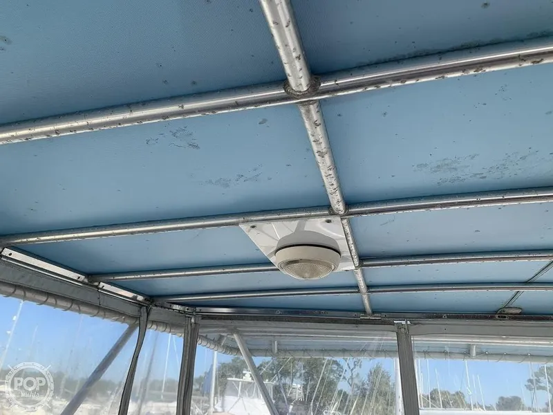 Slide: The Image of 1994 Cruisers Yachts Express Bridge canopy and frame structure. - 6