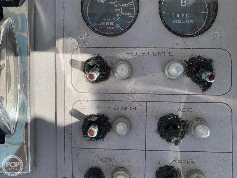 Slide: The Image of Close-up of control panel on 1994 Cruisers Yachts Express Bridge. - 19