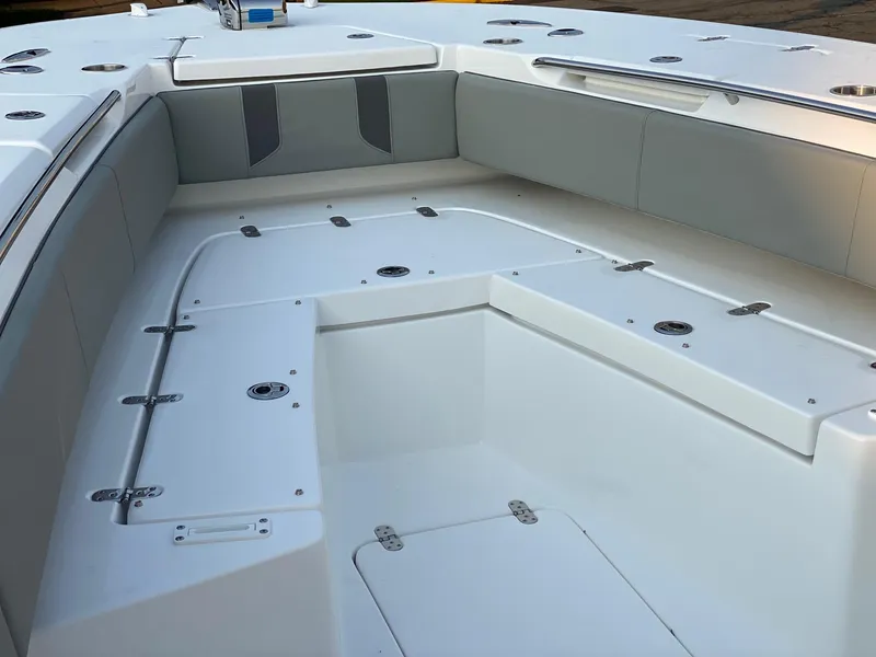 Slide: The Image of 2024 Cape Horn 34 XS boat interior with spacious seating and storage compartments. - 11
