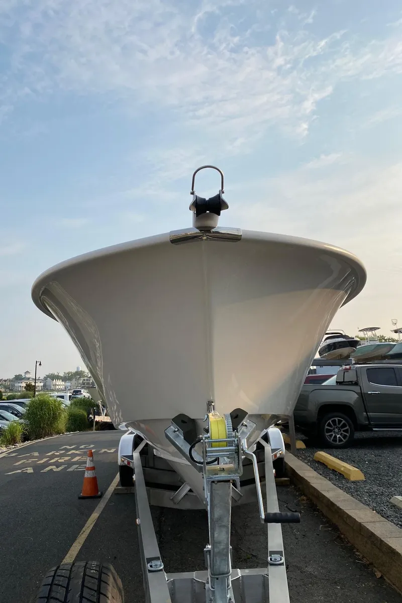 Slide: The Image of 2024 Cape Horn 34 XS boat on trailer, front view. - 2