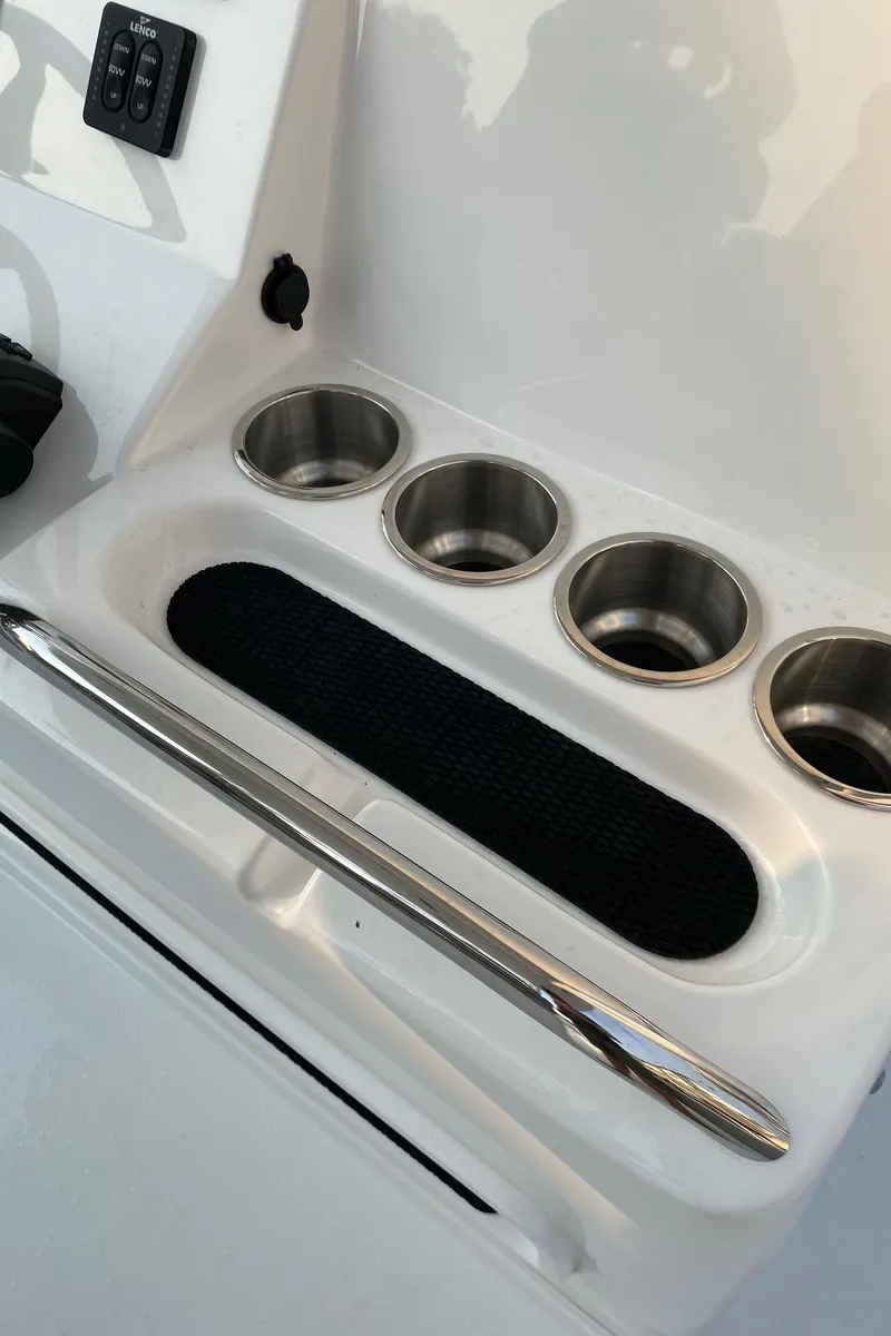 Slide: The Image of Cup holders and storage on 2024 Cape Horn 34 XS boat. - 26