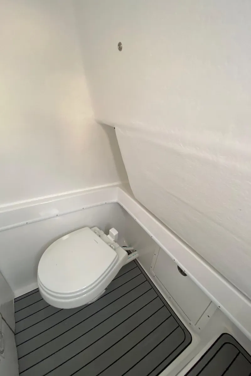 Slide: The Image of 2024 Cape Horn 34 XS boat interior bathroom with toilet. - 27