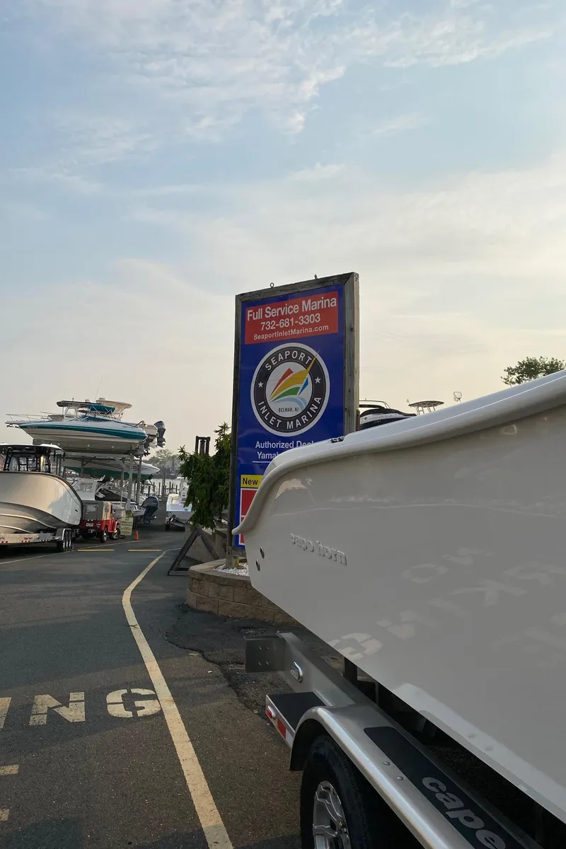 Slide: The Image of 2024 Cape Horn 34 XS boat at a full-service marina with other boats. - 4