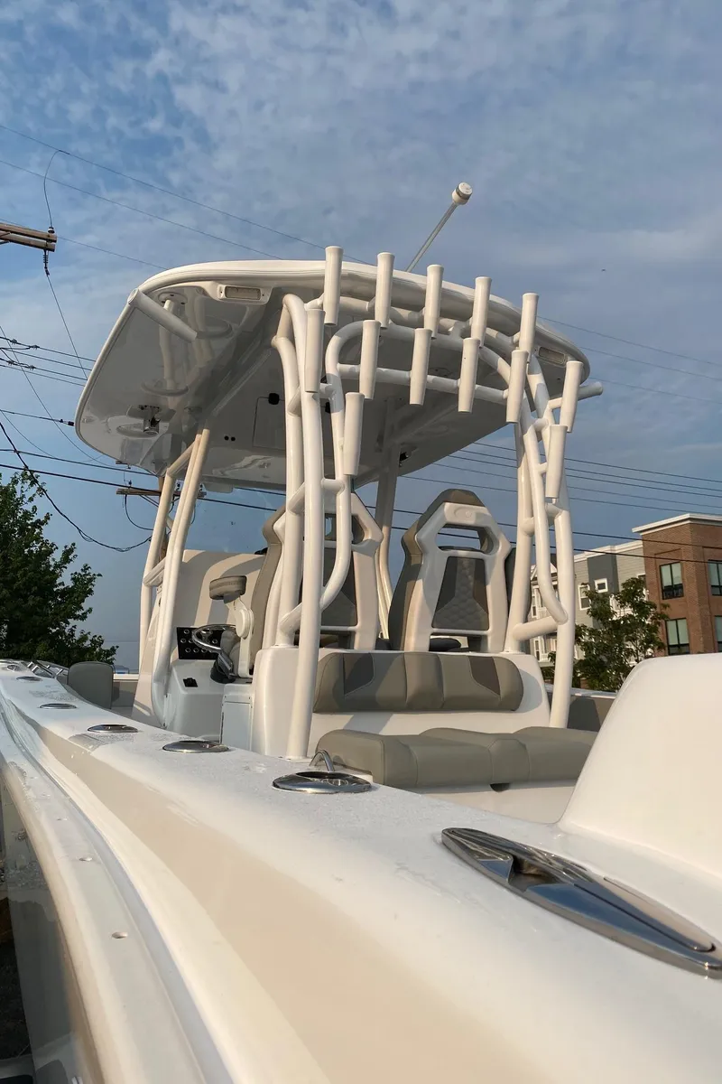 Slide: The Image of 2024 Cape Horn 34 XS boat with T-top and rod holders. - 5