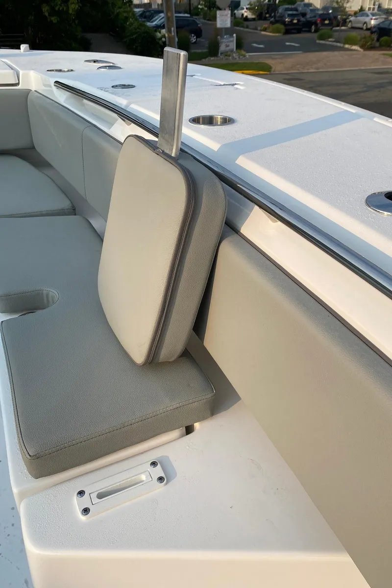 Slide: The Image of 2024 Cape Horn 34 XS boat seating area with cup holders. - 8