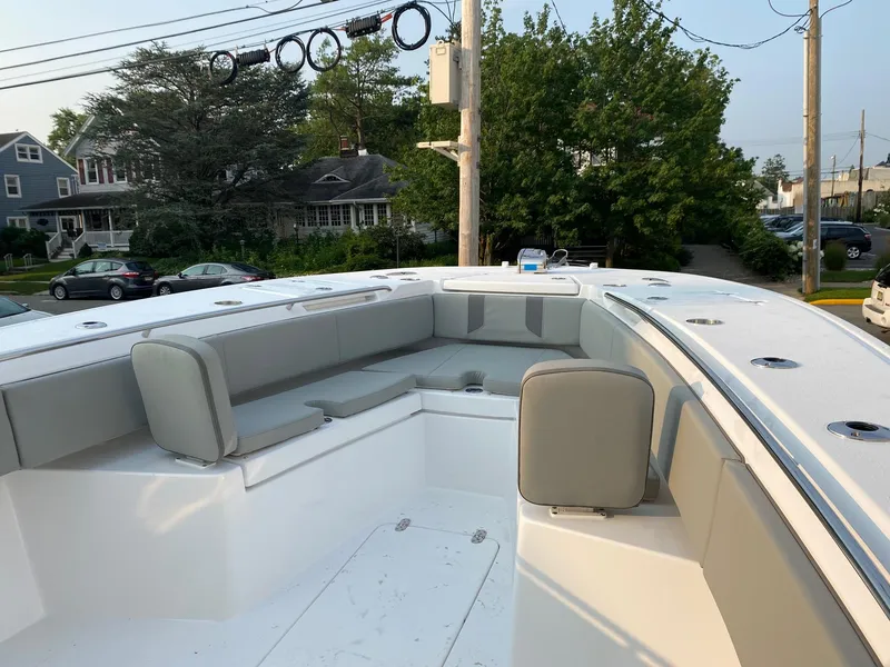 Slide: The Image of 2024 Cape Horn 34 XS boat with spacious seating area and modern design. - 9