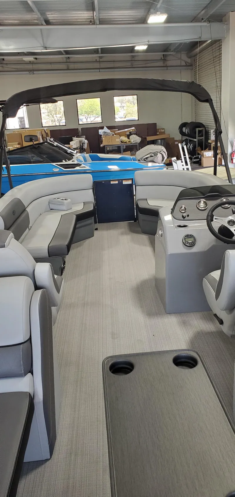 Slide: The Image of 2022 Veranda VISTA VIEW 22RC pontoon boat interior with seating and helm. - 5
