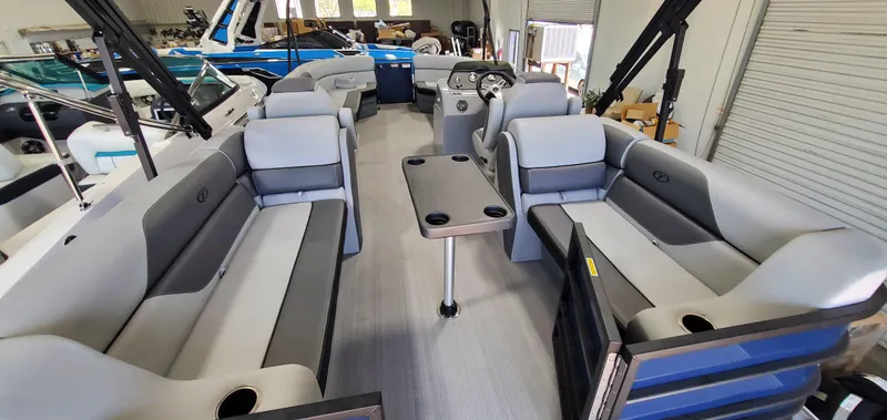 Slide: The Image of 2022 Veranda VISTA VIEW 22RC pontoon boat interior with spacious seating and table. - 6