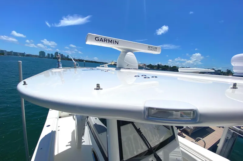 Slide: The Image of 2020 Regulator 31 boat with Garmin radar on a sunny day. - 15