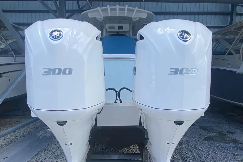 Slide: The Image of 2020 Regulator 31 boat with twin 300 horsepower outboard engines. - 3