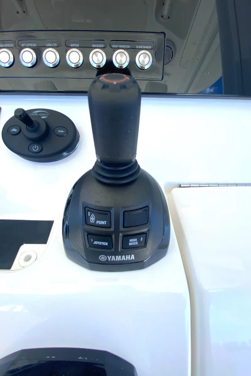 Slide: The Image of Yamaha joystick control on 2020 Regulator 31 boat dashboard. - 40