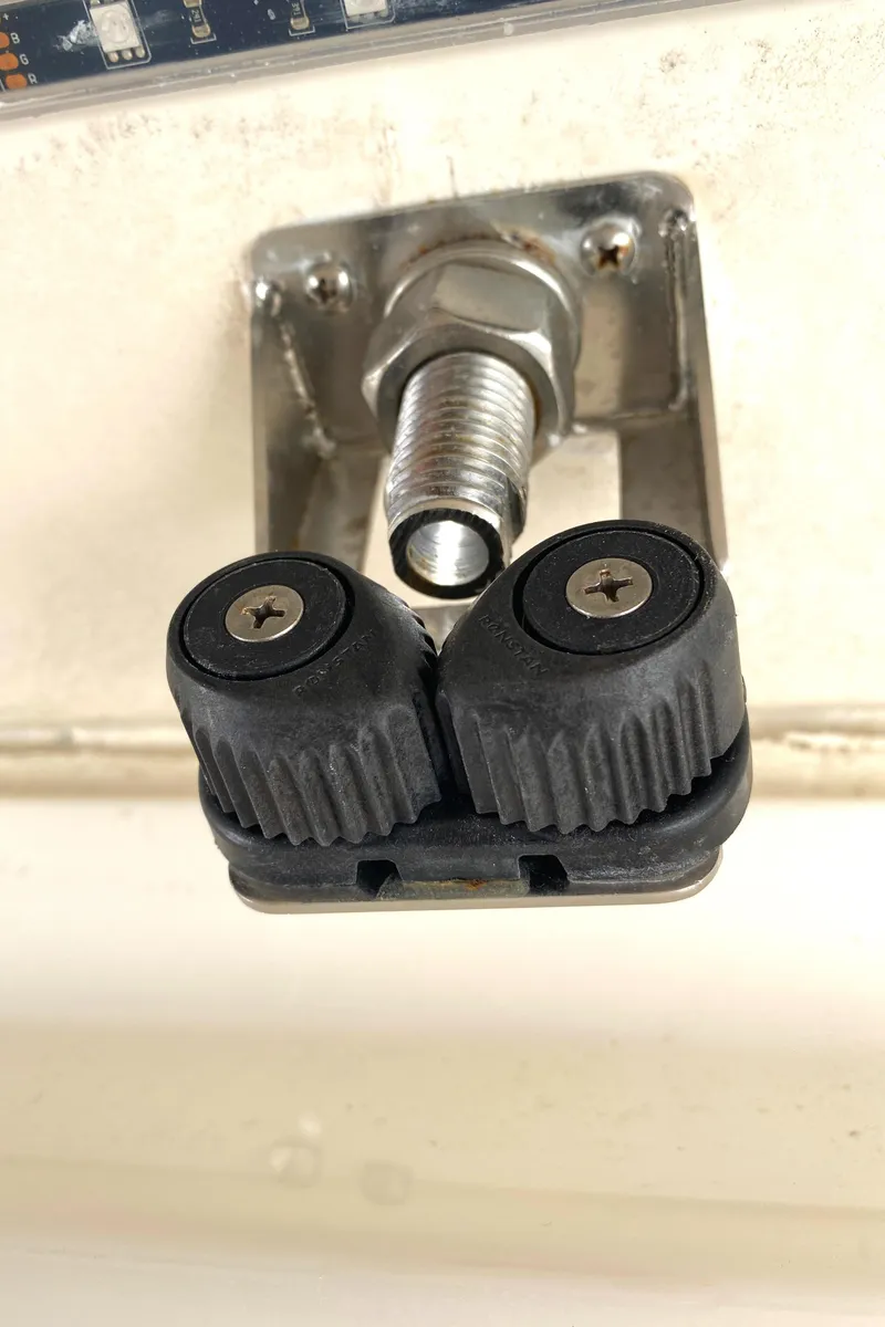 Slide: The Image of Close-up of a 2020 Regulator 31 boat component with dual knobs. - 48