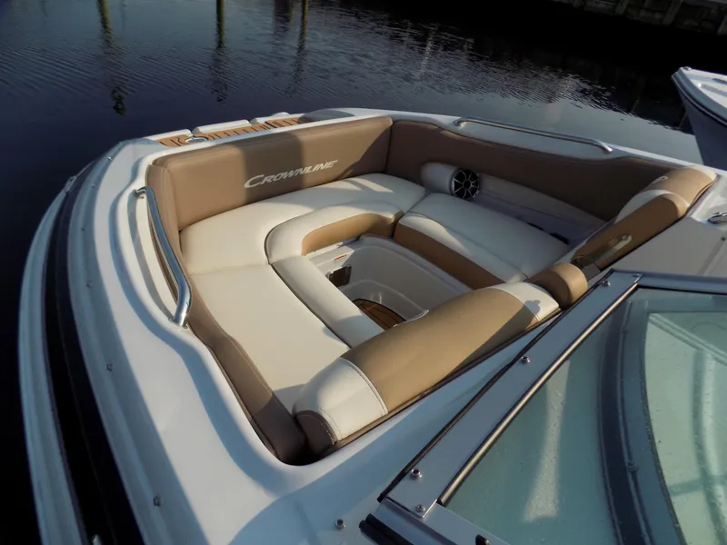 Slide: The Image of 2020 Crownline Eclipse E235 XS boat with luxurious seating and elegant design. - 4