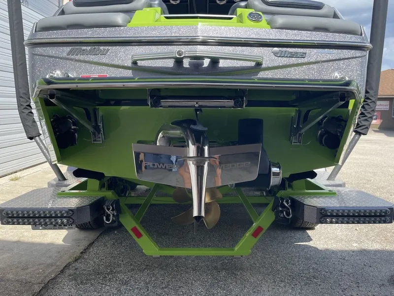 Slide: The Image of Rear view of a 2016 Malibu M235 boat with a Power Wedge. - 2