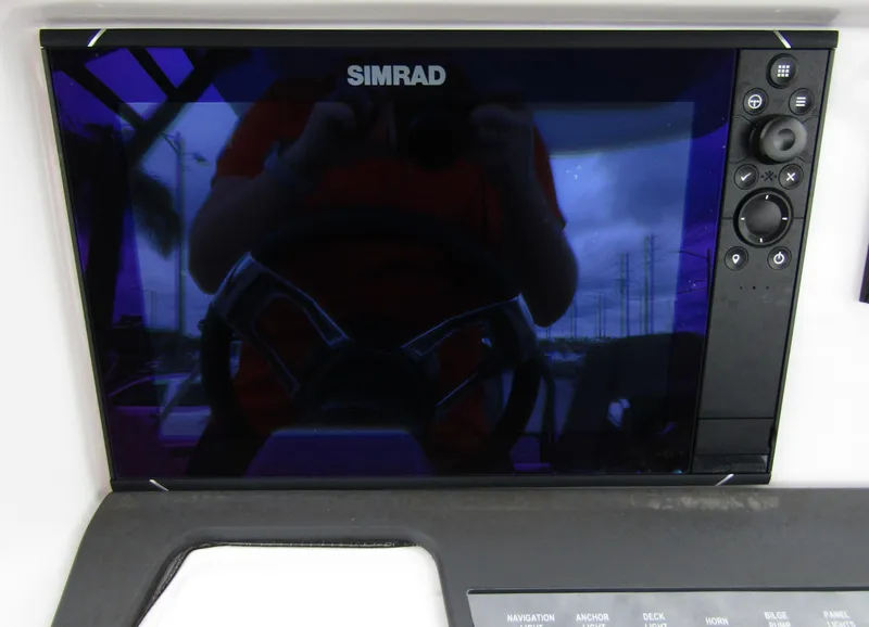 Slide: The Image of Simrad display on 2022 Axopar 22 T-Top boat dashboard. - 14