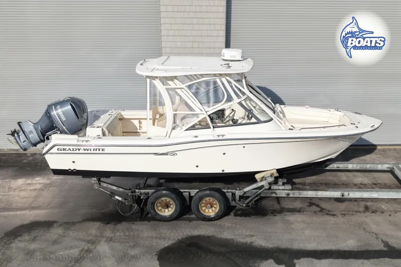 The Image of 2016 Grady-White Freedom 255 boat on trailer, side view, with Yamaha engine. - 0