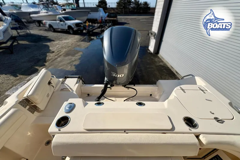 Slide: The Image of 2016 Grady-White Freedom 255 boat with Yamaha 300 engine at marina. - 13