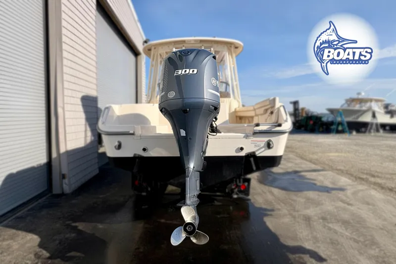 Slide: The Image of 2016 Grady-White Freedom 255 boat with powerful 300 HP outboard motor. - 15
